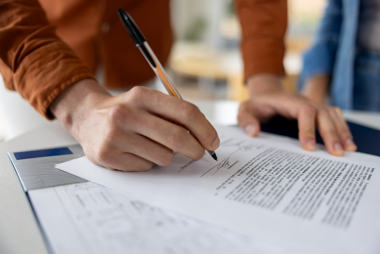 An attorney finalizing the terms of a fee division